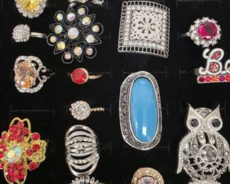 Vintage and fashion jewelry collection featuring rings, earrings, bracelets, necklaces, and accessories in gold and silver tone finishes