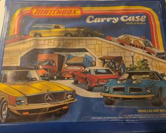 Matchbox case includes cars. Pristine!