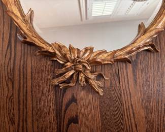 Hollywood Regency Ornate Gold Mirror with Carved Laurel Leaf Frame. Some Damage. Measures 21" W x 30" H. Photo 2 of 4