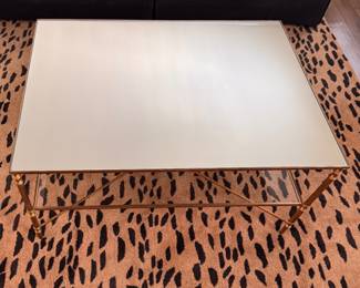 Uttermost Henzier Gilded Metal Coffee Table with Mirrored Top and Glass Shelf. Measures 38" L x 28" W x 19 1/2 " H. Photo 4 of 4.