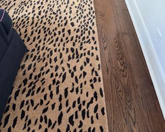 Safavieh Sodo Cheetah Print Wool Rug. Measures 9' 6" x 13' 6". Photo 2 of 3.