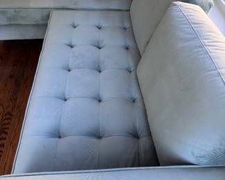 Bloomingdale Velvet Tufted Reversible Sofa in Sea Green with Walnut Finish Legs. Measures 80" W x 36"D x (63" L Chaise). Photo 3 of 4.