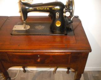 Singer in cabinet works great