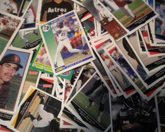 Football and baseball cards  offered in alphabetical order