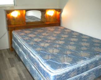 Queen bed complete with lighted headboard