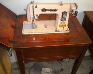 Atlas sewing machine in cabinet   needs on/off switch  runs constantly