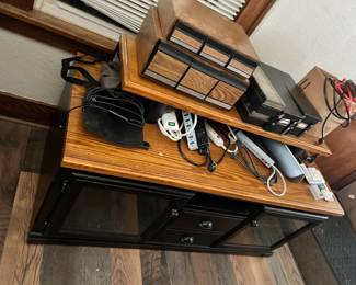 Entertainment Center/ tv stand. Many many many extension cords & power strips
