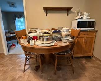 kitchen wares, oak table, microwave and microwave stand