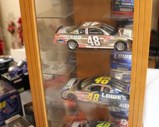 No 48 Lowes and Other Model cars in showcase
