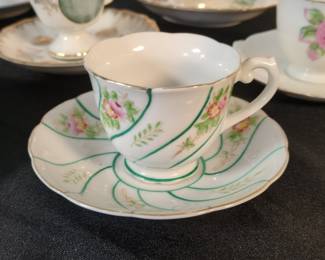 Vintage Made in Occupied Japan Teacup and Saucer Set with Pink Roses and Green Swirls