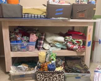 Fabric!!! We have cotton, fleece, upholstery and others of various yardage.