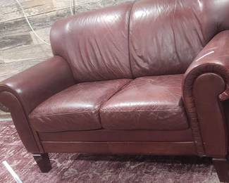 leather loveseat and rug, folding card table