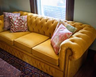 vintage chesterfield yellow tufted couch