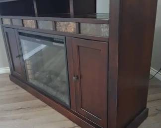 Entertainment center with a electric fire place