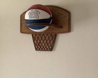 Wood basketball backboard and MBA ball