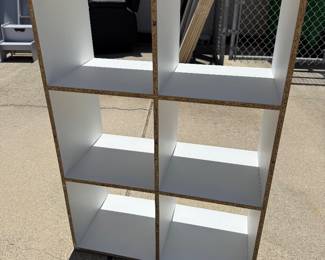 IKEA bookshelves, and desks