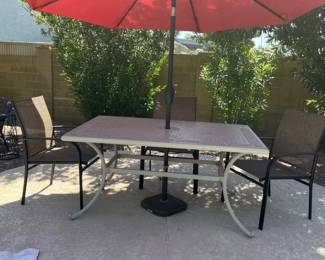  03 Outdoor Metal Table With Three Mesh Chairs And A Patio Umbrella With Stand