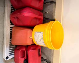 Gas cans and buckets lot