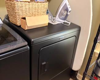 Maytag dryer with iron and ironing board