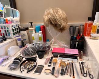 Beauty and cosmetics lot with brushes and hair accessories