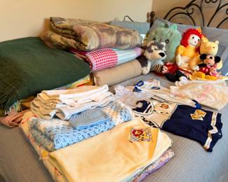 Baby clothes, blankets and plush toys