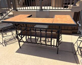 Tile-top patio dining table with chairs