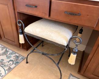 Wrought iron vanity stool with tasseled cushion