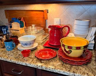 Assorted kitchenware — bowls, pitcher, mugs, dishes