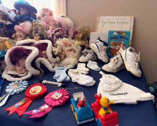Baby items — shoes, books, bibs and toys
