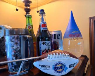 Cowboys Super Bowl XXVIII football and vintage bottles