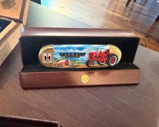 Farmall collectible tractor knife in display box