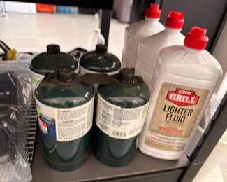 Propane canisters and grill lighter fluid