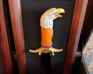 Framed eagle-head collector dagger