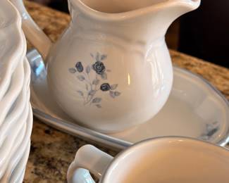 Blue floral china creamer and gravy boat