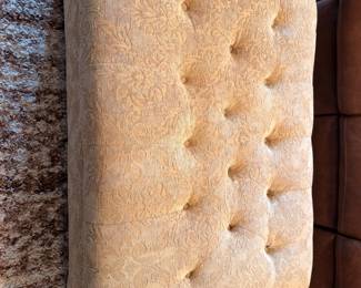Tufted upholstered ottoman