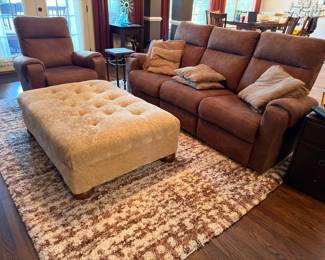 Brown suede reclining sofa, chair and tufted ottoman