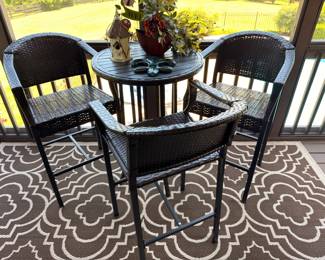 Wicker bistro table with two chairs
