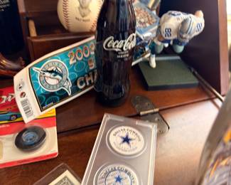 Collectible Coke bottle, signed baseball and Cowboys coin set