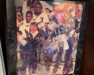 Framed autographed Jimmy Johnson Cowboys team photo