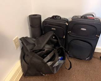 Luggage set — rolling suitcases and duffle bags