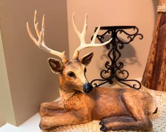 Resting deer buck figurine