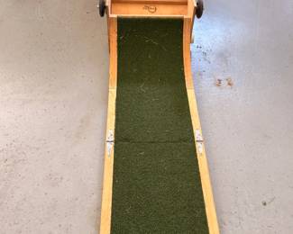 Wooden roll-down ball toss game