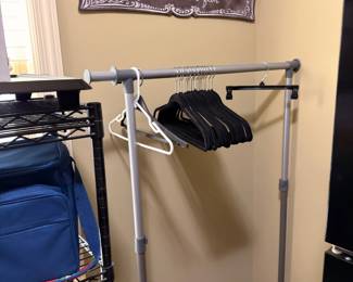 Rolling garment rack and Laundry sign