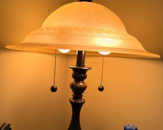 Table lamp with frosted glass dome shade