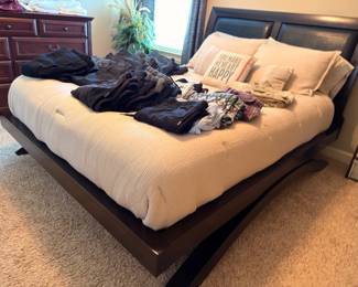 Queen platform bed with wood headboard