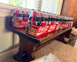 Collectible Coca-Cola commemorative six-pack bottles