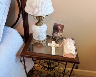 Milk glass lamp and iron glass-top side table