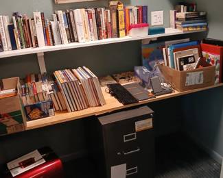 Paper shredder, file cabinet, books, office