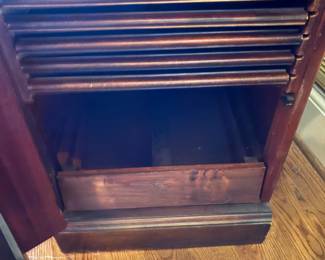 collapsible dining table -looks like a chest of drawers; pull out front and it becomes a table with leaves stored inside!