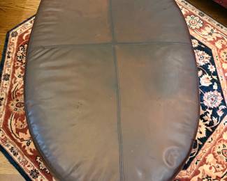 oval leather ottoman by Thomasville